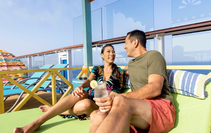 Couple lounging on cruise deck